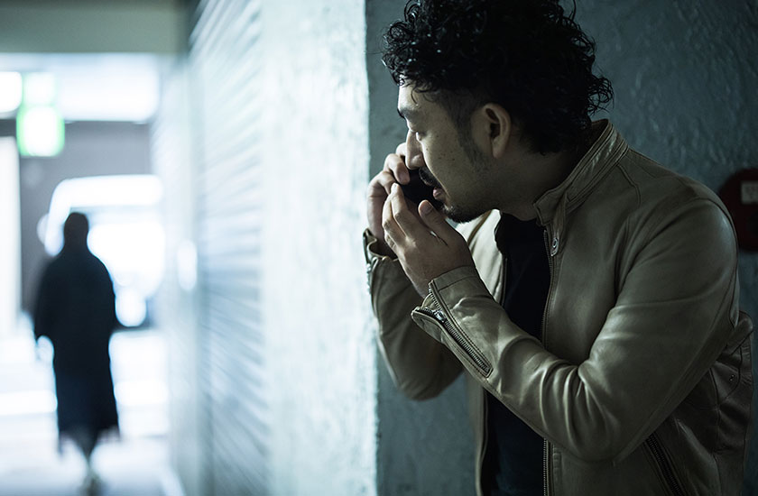 浮気調査中の探偵